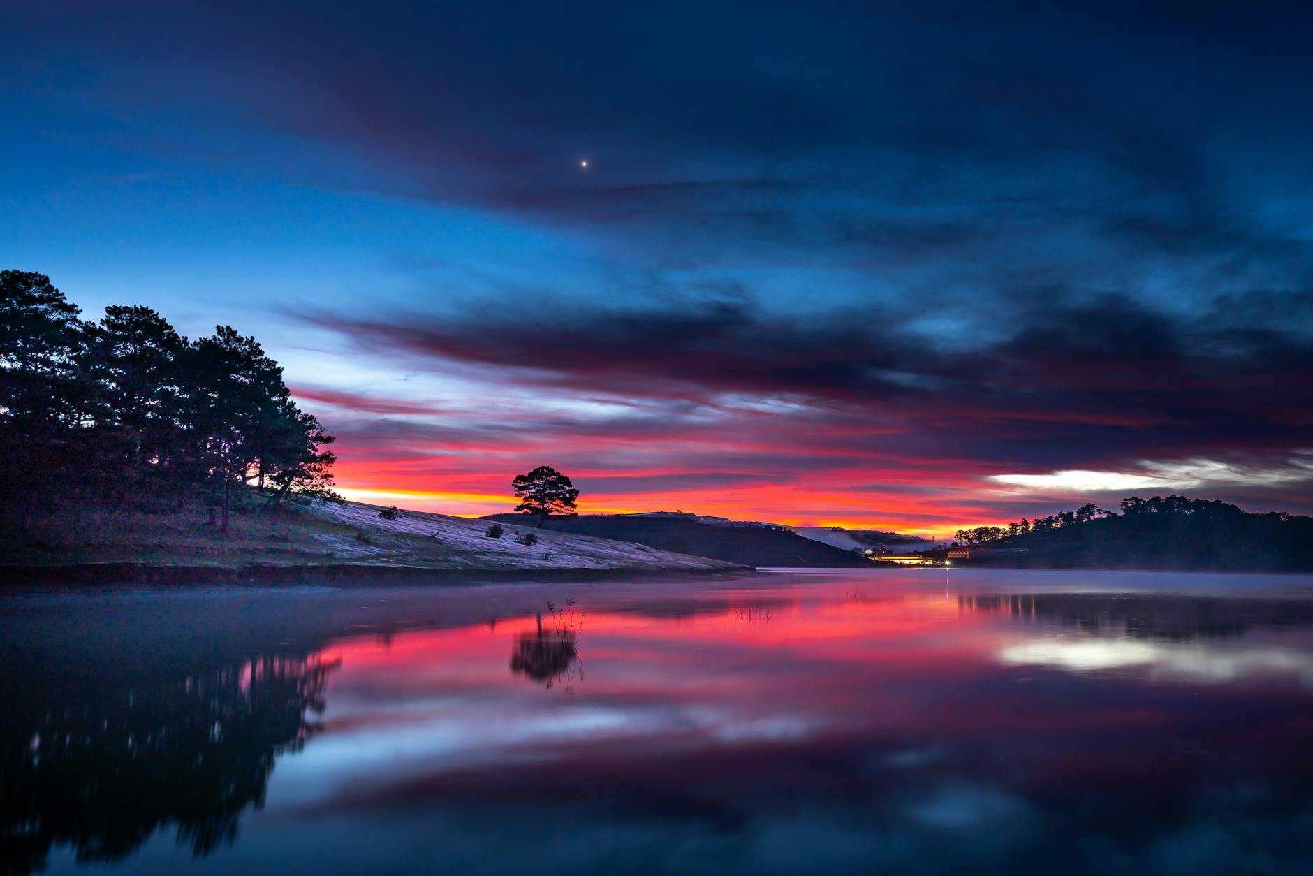 calm body of water during golden hour